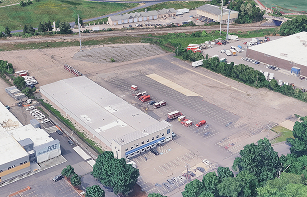 Prescott IOS secures lease of 151 Rivermoor St. for Eastern Bus Co.
